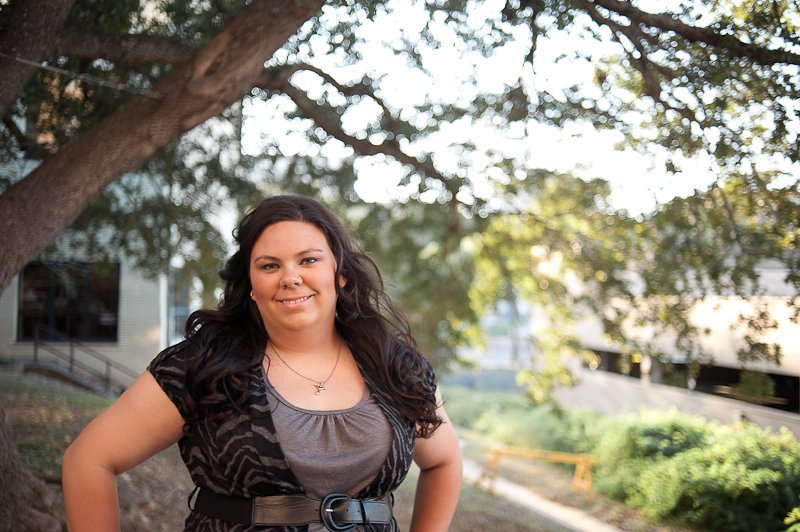 texas state graduation photographer, austin graduation portraits, back lit girl in college campus