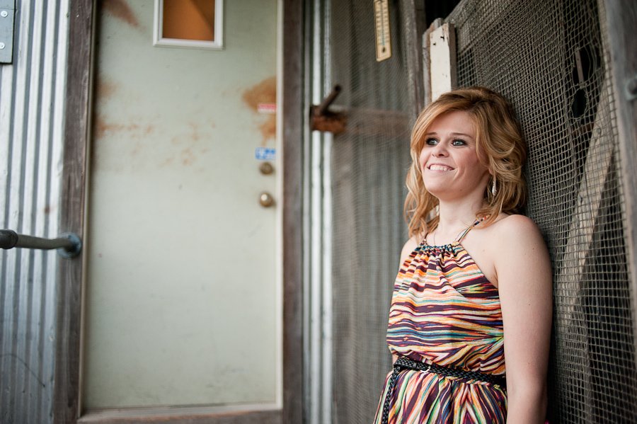 graduation pictures of a girl at Texas State University