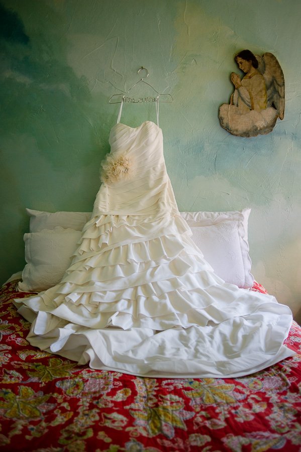 wedding dress hanging shot, vintage ranch austin wedding, rustic chic dress hanging