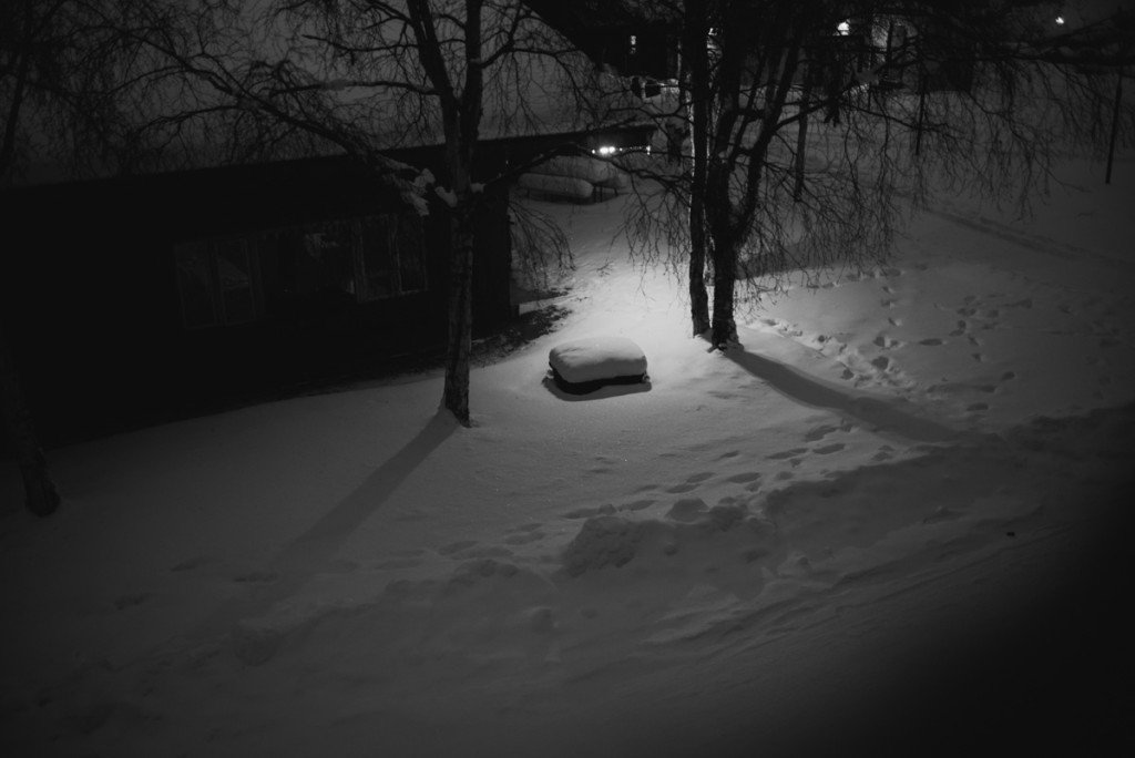 black and white photograph of 2 feet of snow in alaska