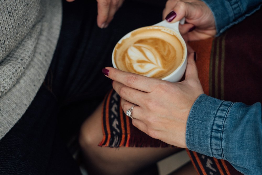 grab a latte at local coffee during your engagement photos at the pearl brewery center in san antonio, lifestyle engagement photographs at pearl brewery in san antonio