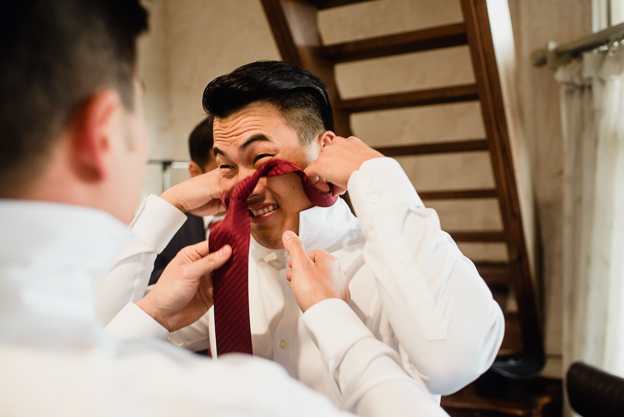 funny face groom with tie on head