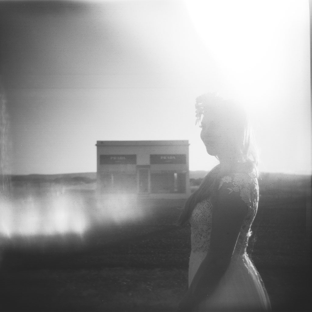 prada marfa portraits in black and white with a bohemian bride