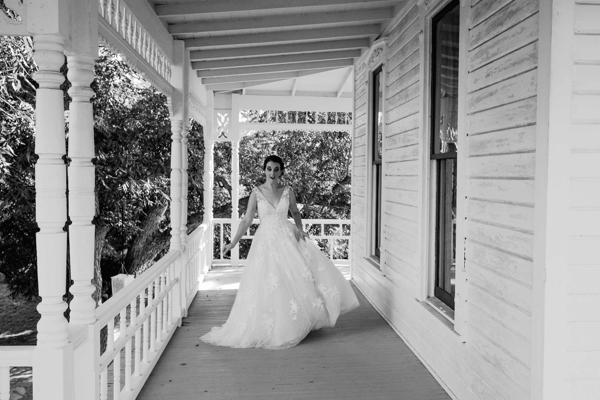 fun and goofy bridal portraits at the barr mansion in austin