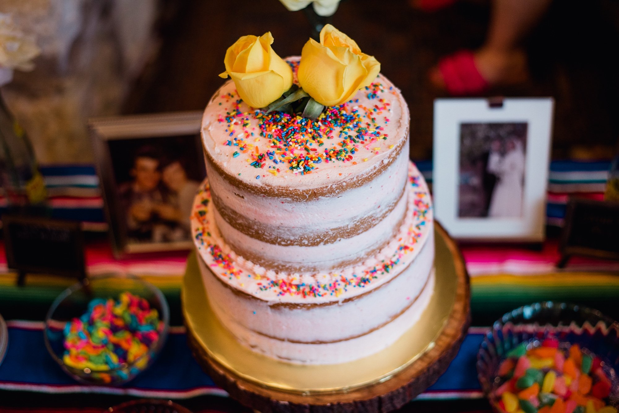 naked cake with yellow roses on top, vegan wedding at the plant at kyle