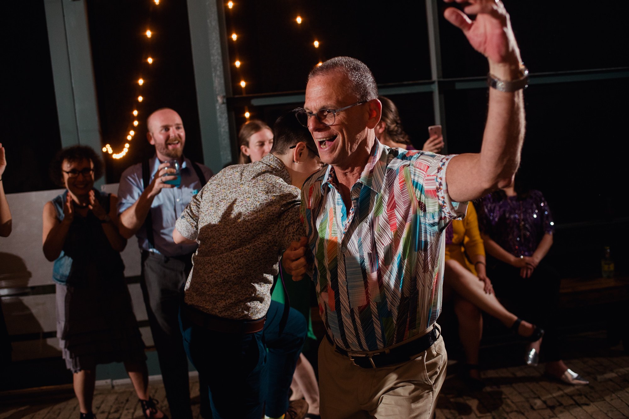 guests dancing at a wedding at the plant at kyle