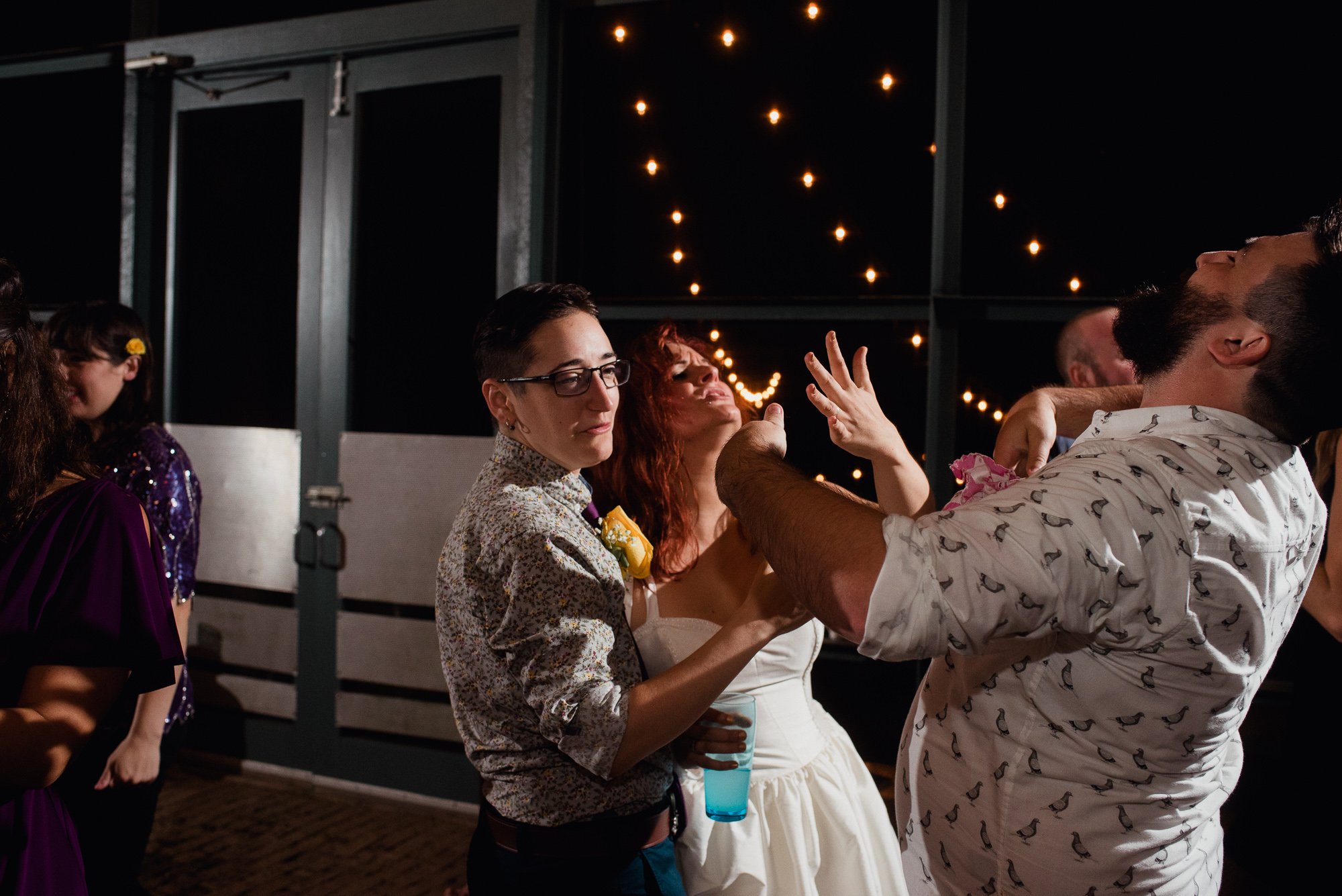 outdoor wedding reception at the plant at kyle under the string lights
