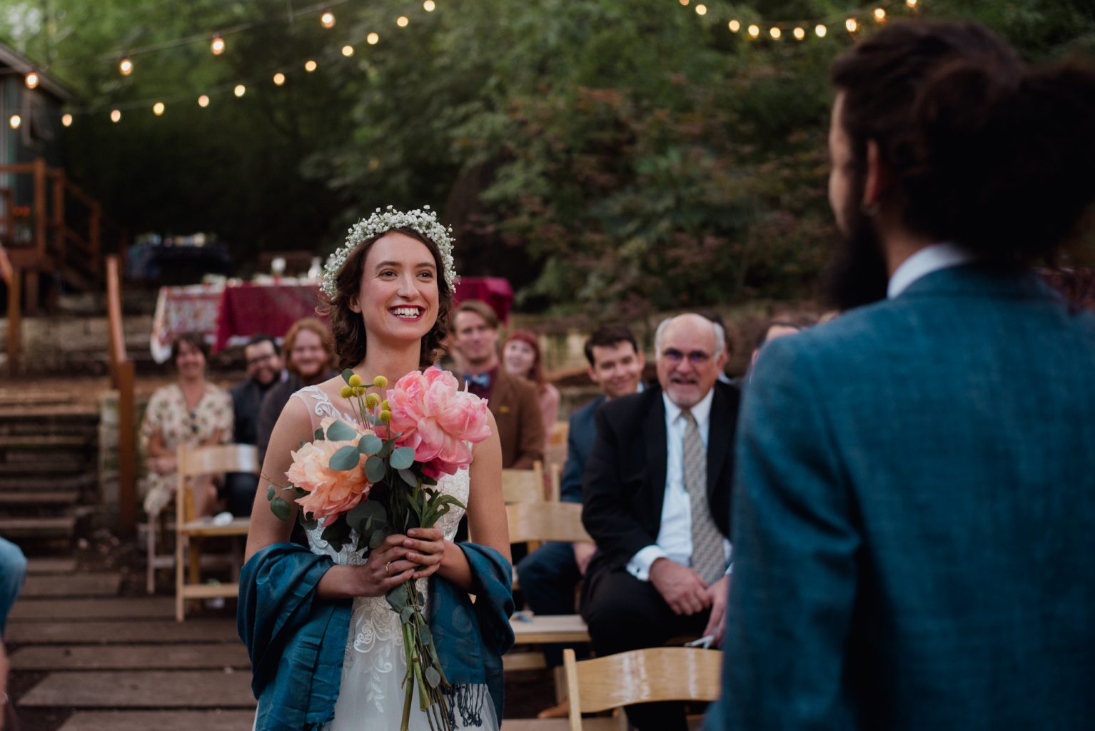 bride smiles at her husband at a winter wedding in Austin texas