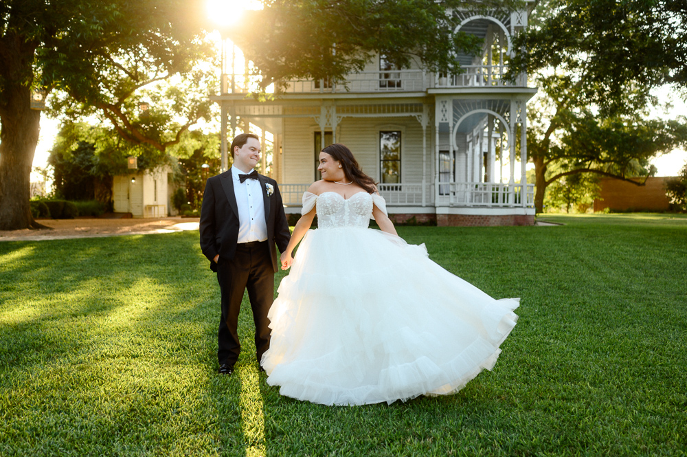 bride and groom portraits on the front lawn of the barr mansion