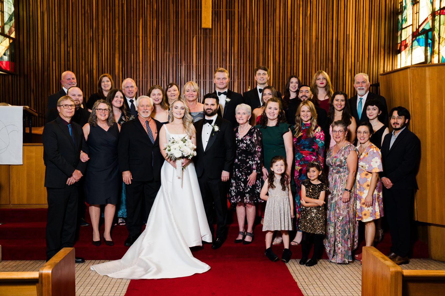 Extended family grouping photos on the altar at Central Presbyterian Church in Austin