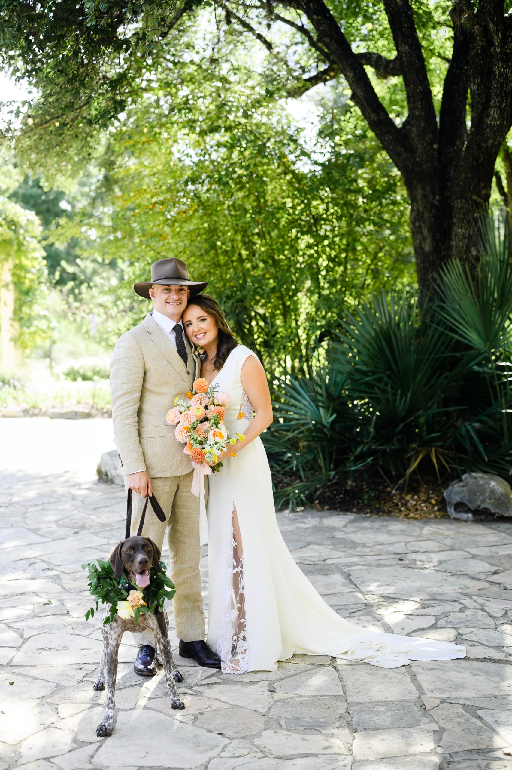 Bride and groom portraits with their dog at Ladybird Johnson Wildflower Center wedding