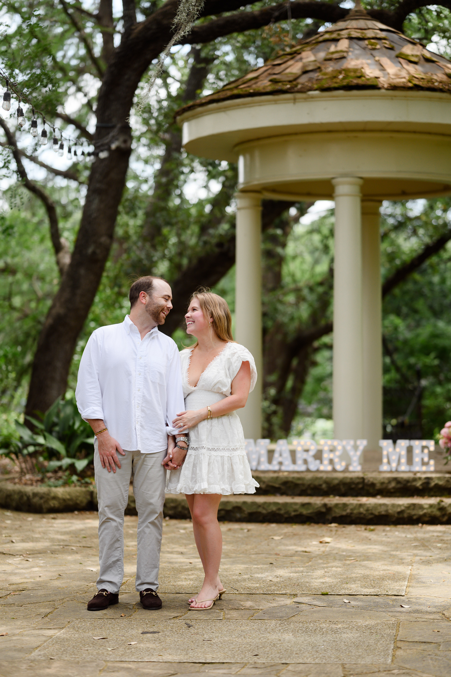 Summertime proposal photos at Laguna Gloria